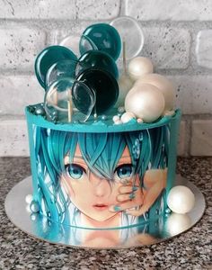 a cake decorated with an anime character on it