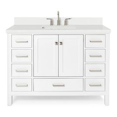 a white bathroom vanity with two sinks and drawers on the top, side by side