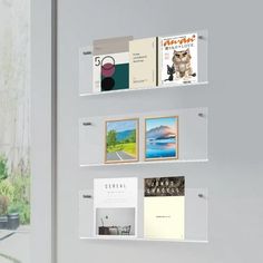 a wall mounted book shelf filled with books