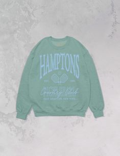 * This is an upgraded, more sustainable sweatshirt to our typical 90's sweatshirts constructed of 70% cotton / 20% recycled polyester / 10% polyester featuring a drop shoulder and back neck patch feat. our logo inside * Join the Hampton's Country Club for some leisurely Pickleball in this vintage varsity style oversized 90's sweatshirt! - Features Hamptons Country Club Pickleball with a pickleball and rackets & EST. 1993 to the side and East Hampton, New York underneath all in a light blue ink- Throwback Oversized Crew Sweatshirt, Oversized Throwback Crew Sweatshirt, Oversized Graphic Print Sweatshirt For Campus, Oversized Crew Neck Throwback Sweatshirt, Oversized Throwback Sweatshirt For Streetwear, Oversized Throwback Sweatshirt For College, Oversized Sporty Sweatshirt With Screen Print, Style Oversized Crewneck, Country Club Design