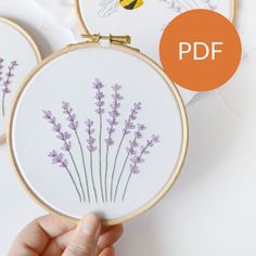 hand embroidered lavender flowers with bees on white background