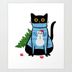 a black cat wearing a blue sweater with a snowman on it's chest