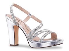 Nina Stormi Platform Sandal - Free Shipping | DSW Silver Round Toe Sandals For Prom, Silver High Heel Sandals With Rhinestones, Sparkling Silver Sandals For Prom, Sparkling Silver Ankle Strap Sandals, Silver Sparkling Ankle Strap Sandals, Glamorous Silver Sandals For Prom, Silver Bedazzled Ankle Strap Heels, Silver Platform Sandals In Synthetic Material, Silver Platform Sandals For Formal Occasions