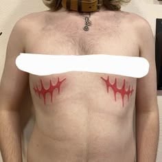 a man with blood painted on his chest