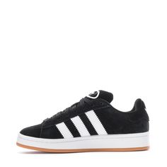 Embrace bolder proportions and a fresh look with these youth shoes, remixing the iconic adidas Campus 80s style to match today's mindset. Updated leather upper, classic 3-Stripes, and Y2K branding forge a new Campus identity for the next generation. Features: Regular fit. Thick laces for a nod to the 00s. Textile lining with padded collars and tongue for comfort. Cupped heel for durability. Cushioned Bounce midsole. Details: Classic lace closure. Upper: Textile. Midsole: Bounce. Outsole: Rubber. Black High-top Adidas Sneakers, All Black Campus 00, Y2k Branding, Campus 00s Black, All Black Adidas Campus, Campus Addis’s, Adidas Campus 80s, Soccer Shop, Youth Shoes