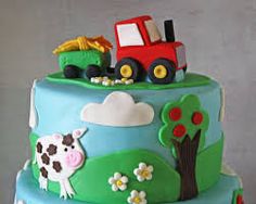 a three tiered cake decorated with farm animals and tractor on the top is blue, green, and red