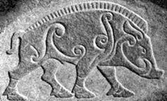 an animal carving is shown in black and white