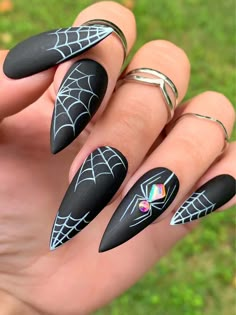 Add a touch of glam to your spooky season with our Halloween Sparkle Spider Web Press on Nails. These custom black false nails feature intricate spider web designs and are perfect for a trendy, festive look. Easy to apply and available in both short and long almond shapes, these nails will make your Halloween shine!📦 What comes with your press on nail kit? 10 nails of your size 24 adhesive tabs 1 nail file 1 cuticle stick Instructions on how to apply and remove them. Finding Your Size:Check out our sizing chart or Visit our sizing tutorial here: Sizing DirectionsNot sure about the size? It’s better to go a bit bigger – you can always file them down for a snug fit.Remember, we can’t do cancellations for size issues, so measuring right is key!Quality You Can TrustWe use only the best materi Black Fingernails, Ongles Bling Bling, Nail Art Halloween, Spooky Black, Matte Black Nails, Nail Sizes