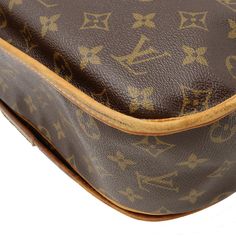 This pre-owned Louis Vuitton Monogram Menilmontant MM Crossbody Bag is a stylish and practical choice for any occasion. Bag Silhouette: Crossbody Bags Color: Brown Fabrication: Coated Canvas Closure Type: Magnetic The monogram canvas body with vachetta leather trim of this bag exudes luxury, while the flat vachetta strap ensures comfort even when carrying the bag for extended periods. The front flap with magnetic button closure keeps your essentials secure, while interior zip and slip pockets pr Bag Silhouette, Monogram Models, Pre Owned Louis Vuitton, Small Leather Goods, Monogram Canvas, Leather Trim, Birkin Bag, Vintage Cartier, Dior Saddle Bag