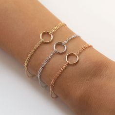 Crafted with a double chain and decorated with a minimal circle at the center. Layered with other bracelet styles and rings for the ultimate fashion-forward look. Colors in: .925 Sterling Silver / Gold Vermeil / Rose Gold Vermeil Hypoallergenic, lead, and nickel free Length: 6.5-7.1in (16.5-18.1cm) Circle Diameter: 0.4in (1cm) Spring clasp closure Handcrafted in NYC #B212 Jewelry Gold Bracelet, Bridal Bracelets, Eternity Bracelet, Dainty Choker Necklace, Circle Bracelet, Gold Armband, Dainty Bracelet, Adjustable Jewelry, Stackable Bracelets