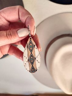 Bohemian Hand-tooled Leather Earrings, Bohemian Teardrop Hand Tooled Earrings, Bohemian Hand Tooled Teardrop Earrings, Hand Tooled Teardrop Bohemian Earrings, Handmade Southwestern Leather Earrings, Bohemian White Leather Jewelry, White Bohemian Leather Jewelry, White Leather Bohemian Jewelry, Brown Hand Painted Teardrop Jewelry