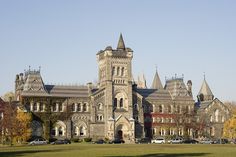 an old building with many windows and towers