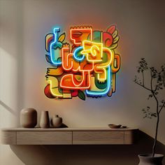 a colorful neon sign on the side of a wall next to a potted plant