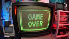 an old tv with the words game over on it