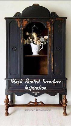 an old china cabinet painted black with white flowers and the words, black painted furniture inspiration