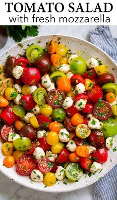 tomato salad with fresh mozzarella in a white bowl