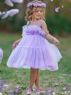 Your precious girl will look red-carpet-ready in this purple tulle tutu dress. Its beautifully layered fabric is decorated with a silky ribbon belt that cinches the waist. She'll be looking like a mini-celebrity in this glam look! Lightweight fabric feels good on her skin, keeping her cool and comfy even on warm summer days. Fully lined skirt gives her the confidence to move and play without worry. She'll be twirling all day long! Perfect for special events, birthday parties, holidays, outings,