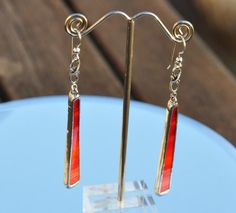 Glass orange & red dangle earrings | Etsy Stained Glass Crafts, Diy Wire Jewelry, Stained Glass Patterns, Etsy Earrings Dangle, Earrings Etsy, Glass Crafts, Orange Red, Wire Jewelry, Clothes Hanger