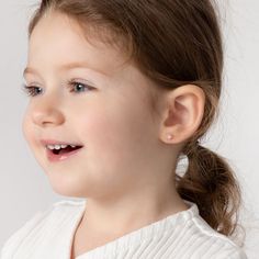 Your little girl will look precious with these adorable baby earrings made of 14k gold which are suitable for sensitive ears. Featuring a cute daisy flower colored with bright enamel colors, leading to a post with safety screw backs for children. These gold flower earrings make a perfect gift for any special occasion such as holidays or birthdays. A complimentary gift box is included for your convenience. Age Group: Adorable for Babies, Infants & Toddlers or Little Girls; Safe for Sensitive Skin Toddler Earrings, Gold Flower Earrings, Baby Earrings, Kids Earrings, Gold Flower, Flower Earrings Studs, Toddler Kids, Flower Studs