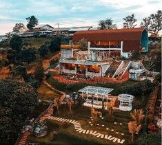 an aerial view of a house and garden