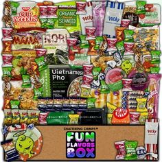 a box filled with lots of different types of food and snacks on top of it