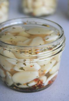 a jar filled with food sitting on top of a table