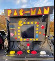 a pac - man game is set up in the parking lot for people to play