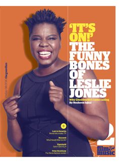 the cover of this magazine features an image of a woman smiling and pointing to her right