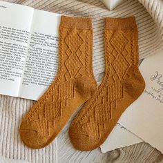 Women's Winter Cashmere Wool Socks are a must-have for staying warm during the colder months. These socks are thick, making them perfect for winter weather, and come in a middle tube height. The socks come in a set of 2 and are designed for casual wear. They feature a solid pattern and are made of wool, a material known for its warmth and durability. With their high-quality materials and functional design, these socks are a great choice for anyone looking to keep their feet warm and comfortable Cable Socks, Texture Socks, Socks Packaging, Cashmere Socks, Hello Ladies, Comfortable Socks, Winter Socks, Long Socks, Wool Socks