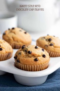 several chocolate chip muffins on a white plate