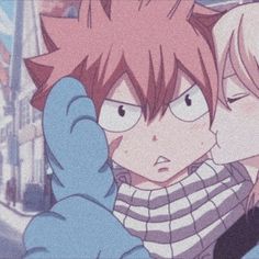 two anime characters hugging each other in the street