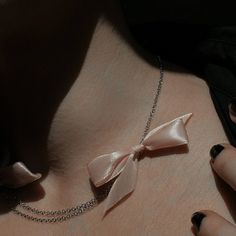 -Stainless Steel, Black Ribbon -Adjustable - Fits Circumference from 16″ - 20″ (40.6cm - 50.8cm) ▶ Ready to Ship on MAY 6TH ---- Dusty Pink Bow Choker Necklace ---- The Pink Bow Choker Necklace is a delicate choker necklace featuring two dusty pink ribbon bows and double stainless steel chain design. Great for a special occasion and your everyday look. Made from lightweight stainless steel, it offers durability without compromising on comfort. The adjustable chain at the back ensures a perfect fit for every wearer. - 2404 Collection ★ SEE BLACK BOW NECKLACE --> https://www.etsy.com/listing/1702806844/necklace-black-bow-choker-stainless?click_key=d18c3e31134daaf13461e7180d266038cf5b143e%3A1702806844&click_sum=4a14465c&ref=shop_home_active_1&frs=1&sts=1  MATERIAL Stainless Steel, Ribbon  SIZ Delicate Choker Necklace, Leather Rings, Romantic Birthday Gifts, Bow Choker, Delicate Choker, Ribbon Choker, Choker Silver, Leather Ring, Bow Necklace