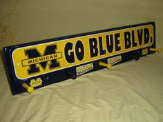 a michigan license plate with the word go blue blvd on it's side