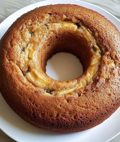 a bundt cake sitting on top of a white plate