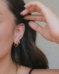 #jewelry #goldjewelry #hoops #hoopearrings #smallhoops #goldhoopearrings #affordablejewelry Small Ear Ear Piercings, Two Piercings Ear Hoop, Dainty Piercings Ears Minimalist Jewelry, Simple Ear Piercings Classy, Minimalist Piercings Ear, Ear Piercing Both Ears, Ear Piercing Ideas Aesthetic Minimalist, Earrings Both Ears, Ideas Para Piercings En La Oreja