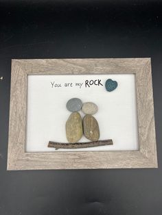 there is a picture frame with rocks in it and the words you are my rock