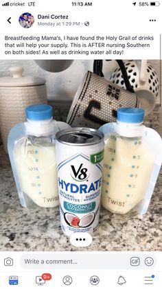 a can of yogurt sitting on top of a counter next to two bottles