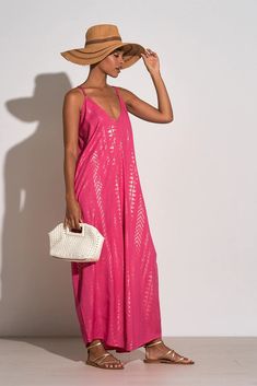 Turn heads in the best-selling pink and gold arrowhead maxi. This flowy dress shimmers with every step, has functional pockets and an amazing silhouette, perfect for that elegance and comfort look! 47% Cotton, 47% Viscose, 6% Metallic Mini Jumpsuit, Fashion Forecasting, Valentine's Day Outfit, Maxi Dress With Sleeves, Flowy Dress, Printed Maxi, Printed Maxi Dress, Holiday Dresses, Pink And Gold