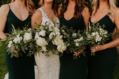 three bridesmaids in green dresses holding bouquets and smiling at the camera while standing outside