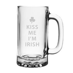 a glass beer mug with the words keep calm and get lucky written in white on it