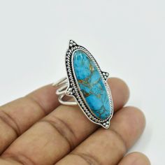 Christmas Sale This One of a kind Ring is adorned with beautiful Copper Turquoise gemstone in sterling silver. Turquoise is the birthstone representing the month of December. About gemstone-Turquoise is the stone of peace that decreases tension,nervousness,tension and stress. It is believed to protect from negativity .It is the stone of clear communication and restores clear vision to the mind. Turquoise is associated with luck,success,ambition and creativity. It act to induce wisdom and underst Triple Band Ring, Watermelon Tourmaline Ring, Antique Silver Rings, Ring Turquoise, Clear Communication, Turquoise Ring Silver, Ring Birthstone, Gold And Silver Rings, Copper Turquoise