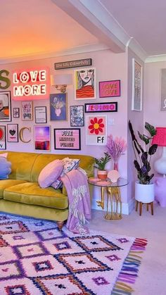 a living room filled with lots of furniture and pictures on the wall next to each other