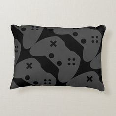 a black and white pillow with skulls on it