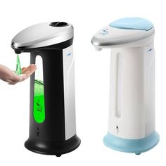 two different types of soap dispensers on white and black bases, one with green liquid in it