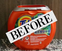 a close up of a can of detergent on a table with a sign that reads, before