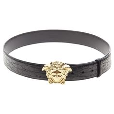 VERSACE $1200 La Medusa gold buckle black scaled leather belt 115cm 44-48" Reference: TGAS/C00208 Brand: Versace Designer: Donatella Versace Model: DCU4140 DFCG D41OH Collection: La Medusa Material: Leather, Metal Color: Black, Gold Pattern: Solid Closure: Pin Extra Details: Signature La Medusa belt from Versace's permanent collection. Gold La Medusa emblem buckle. 100% Genuine Crocodile leather belt - very limited edition in genuine crocodile. Estimated Retail Price: USD 1200 Made in: Italy CONDITION: Condition: Unworn in mint condition, with tags. Comes with: Authenticity card. Designer tags. One dust bag. Designer box. SIZING Designer size: 115 Size reference: Size 115 / Pant Size 44 / 46 / 115cm MEASUREMENTS: Smallest hole: 110cm / 42.9" Mid hole: 115cm / 44.9" Largest hole: 120cm / 46 Versace Virtus Belt, Crocodile Leather Belt, Versace Designer, Donatella Versace, Crocodile Leather, Gold Pattern, Leather Belt, Versace, Dust Bag