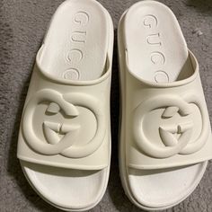 Women’s Gucci Slides With Interlocking G Off White Size 37. I Purchased These In The Spring Directly From The Site. They Were Worn A Handful Of Times. Still In Near Mint Condition. Any Questions Please Feel Free To Ask. I Have All The Original Packaging, Bags, Box, Tags ,Stuffing Etc. Gucci Slide, Gucci Shoes Women, Gucci Slides, Packaging Bags, Off White Color, Gucci Shoes, Women's Shoes Sandals, Mint Condition, Shoes Sandals