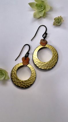 Hammered Hoop Shape Earrings.  I sell only vintage jewelry and I use my pictures as part of the description. As with most vintage items there may be wear consistent with the age.  Find more unique vintage earrings and jewelry in my store at AllieAnneCo.etsy.com Thank you for stopping by! 😊 https://www.etsy.com/shop/AllieAnneCo Handmade Retro Dangle Jewelry, Retro Handmade Dangle Jewelry, Vintage Brass Hoop Earrings For Gifts, Vintage Dangle Metal Earrings, Gold Round Soldered Earrings, Handmade Metal Retro Earrings, Retro Dangle Earrings For Pierced Ears, Handmade Retro Metal Earrings, Gold Round Earrings With Soldered Details