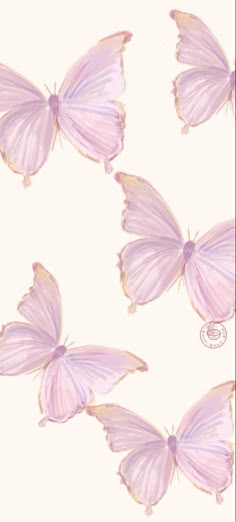 several pink butterflies flying in the air with their wings spread out and facing different directions