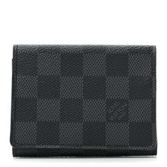 This is an authentic LOUIS VUITTON Damier Graphite Envelope Business Card Holder. This chic compact wallet is crafted of Louis Vuitton signature damier canvas in black and grey. The facing flap opens to a black cross-grain leather interior with card slots and flat pockets. Compact Wallet, Black Cross, Louis Vuitton Wallet, Business Card Holder, Business Card Holders, Card Holder Wallet, Leather Interior, Authentic Louis Vuitton, Louis Vuitton Damier